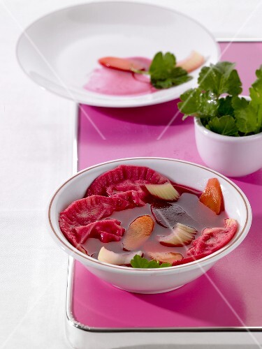 Beetroot soup with sauerkraut Maultaschen (filled pasta)