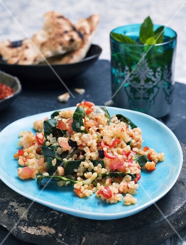 Bulgar pilaw with tomatoes and chard (Turkey)