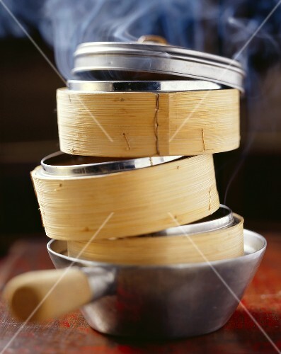 Steaming baskets in a saucepan