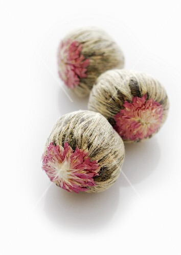 Three jasmine tea balls
