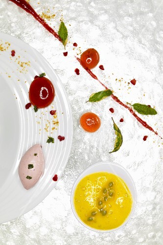 Passionfruit sabayon, raspberry caviar, sage (molecular gastronomy)