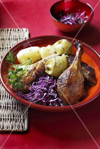 Goose leg with red cabbage