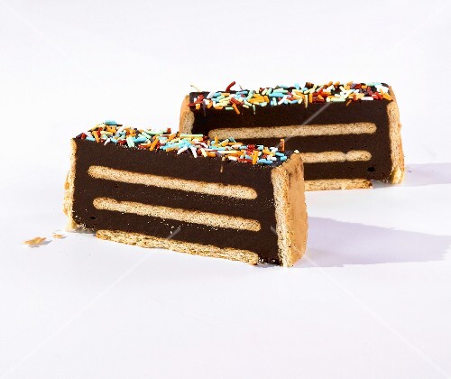 Chocolate and biscuit cake with colourful sugar strands