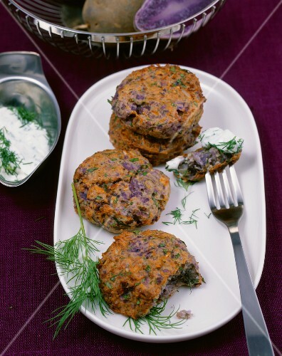 Purple potato cakes with a cream cheese dip