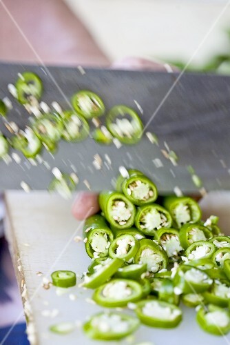 Slicing green chillies