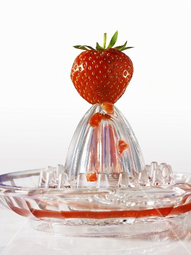 Strawberry on citrus squeezer