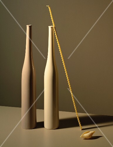 An arrangement of vases and pasta