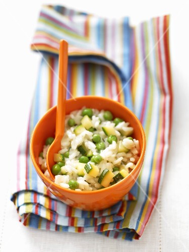 Risotto with peas and courgettes for children