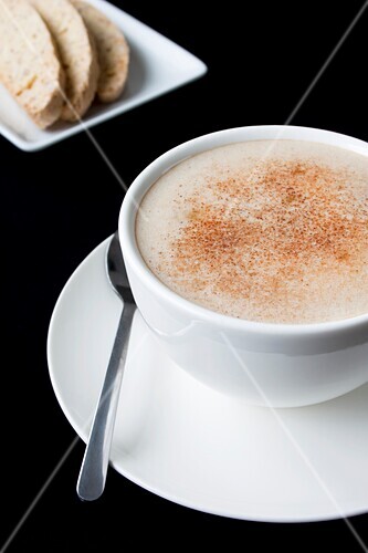 Caffè latte with biscotti