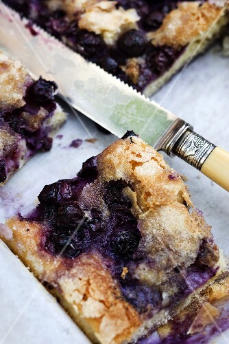 A slice of blueberry and butter cake