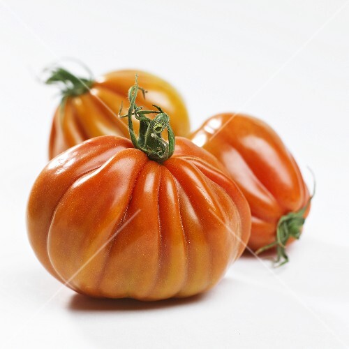 Three bulls heart tomatoes