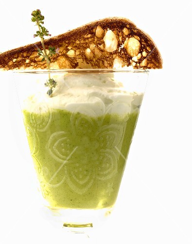 Cold courgette soup with a lemon thyme emulsion
