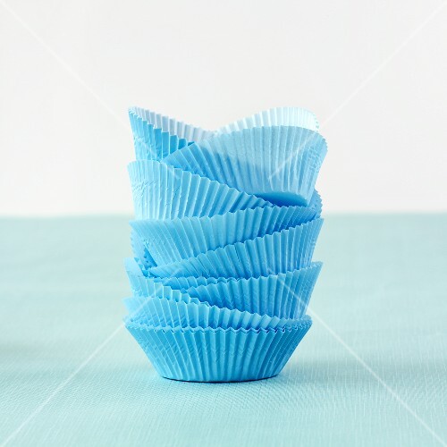 A stack of blue paper cases