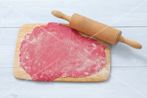 Rolled out noodle dough, pink