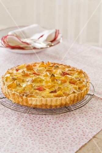 Vegetable quiche on a wire rack