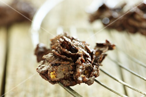 Chocolate crispy cakes on a wire rack
