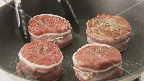 Fillet mignon being prepared (US-English Voice Over)