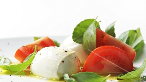 Tomatoes with mozzarella and basil