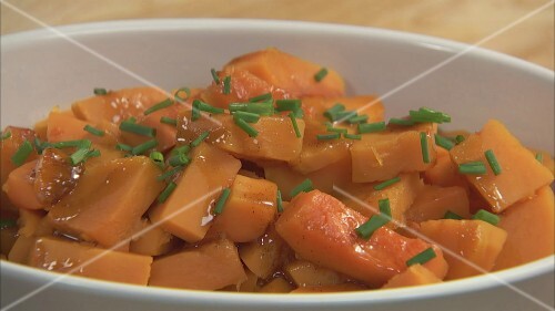 Preparing pumpkin with maple glaze