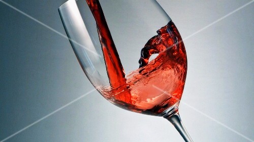 Pouring red wine