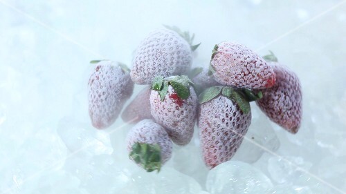 Frozen strawberries rotating