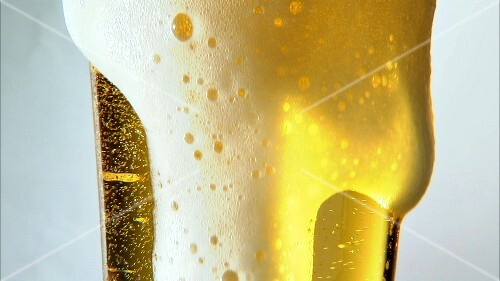 Pouring a glass of beer (detail)