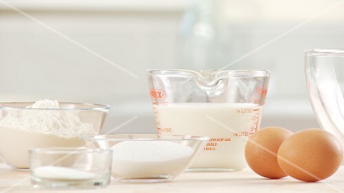 Baking ingredients: eggs, salt, sugar, flour, milk