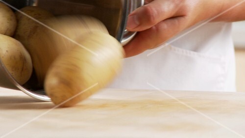 Cooked potatoes being left to cool