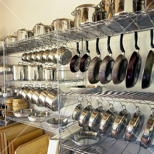 Pots and pans, some hanging up