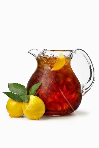 A Pitcher of Iced Tea with Lemons