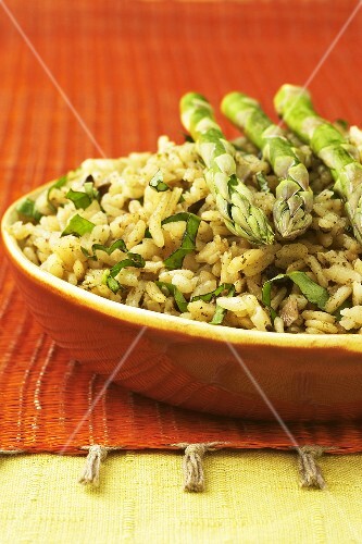 Bowl of Risotto with Basil and Whole Asparagus Spears