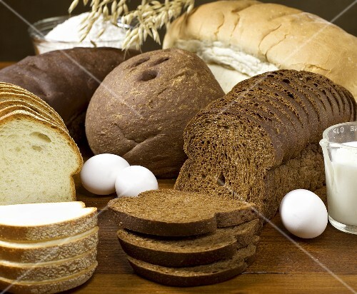 Assorted Loaves of Artisan Bread with Ingredients
