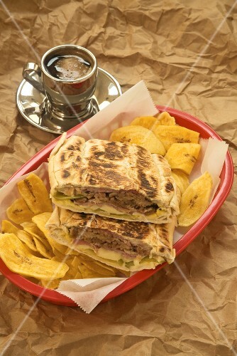 Cuban Sandwich Halved with Plantain Chips