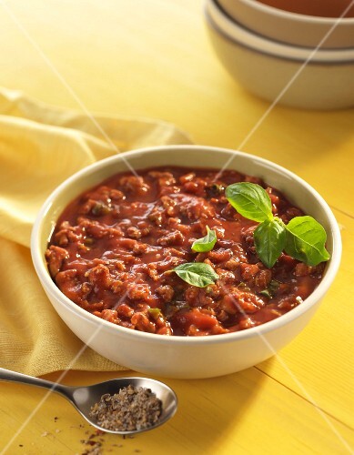 Bowl of Turkey Chili on a Yellow Table