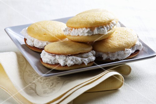 Lemon Whoopie Pies with Vanilla Cream on a Square Plate