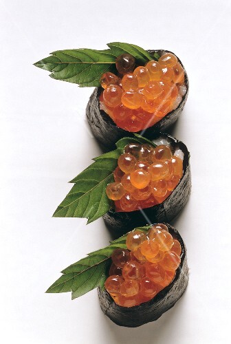 Sushi: three gunkan-maki with caviare
