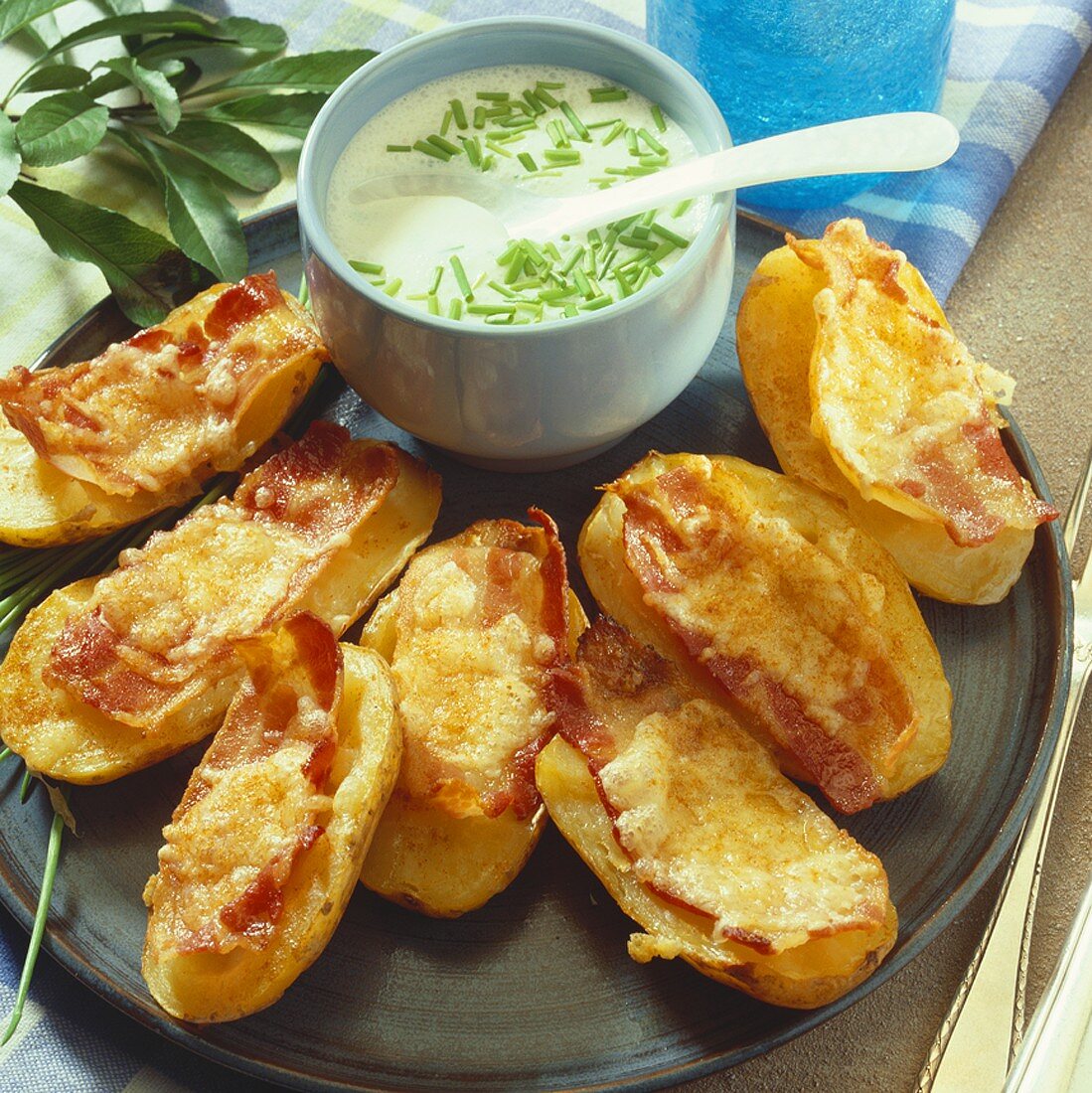 Baked potatoes with cheese and bacon topping