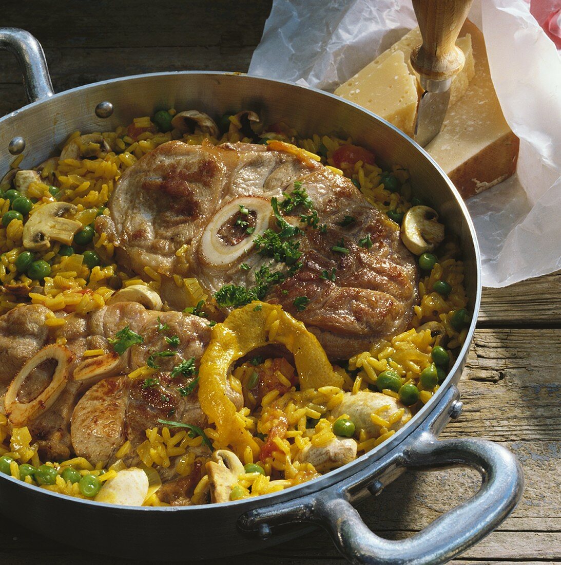 Braised slices of lamb shank with saffron vegetable rice