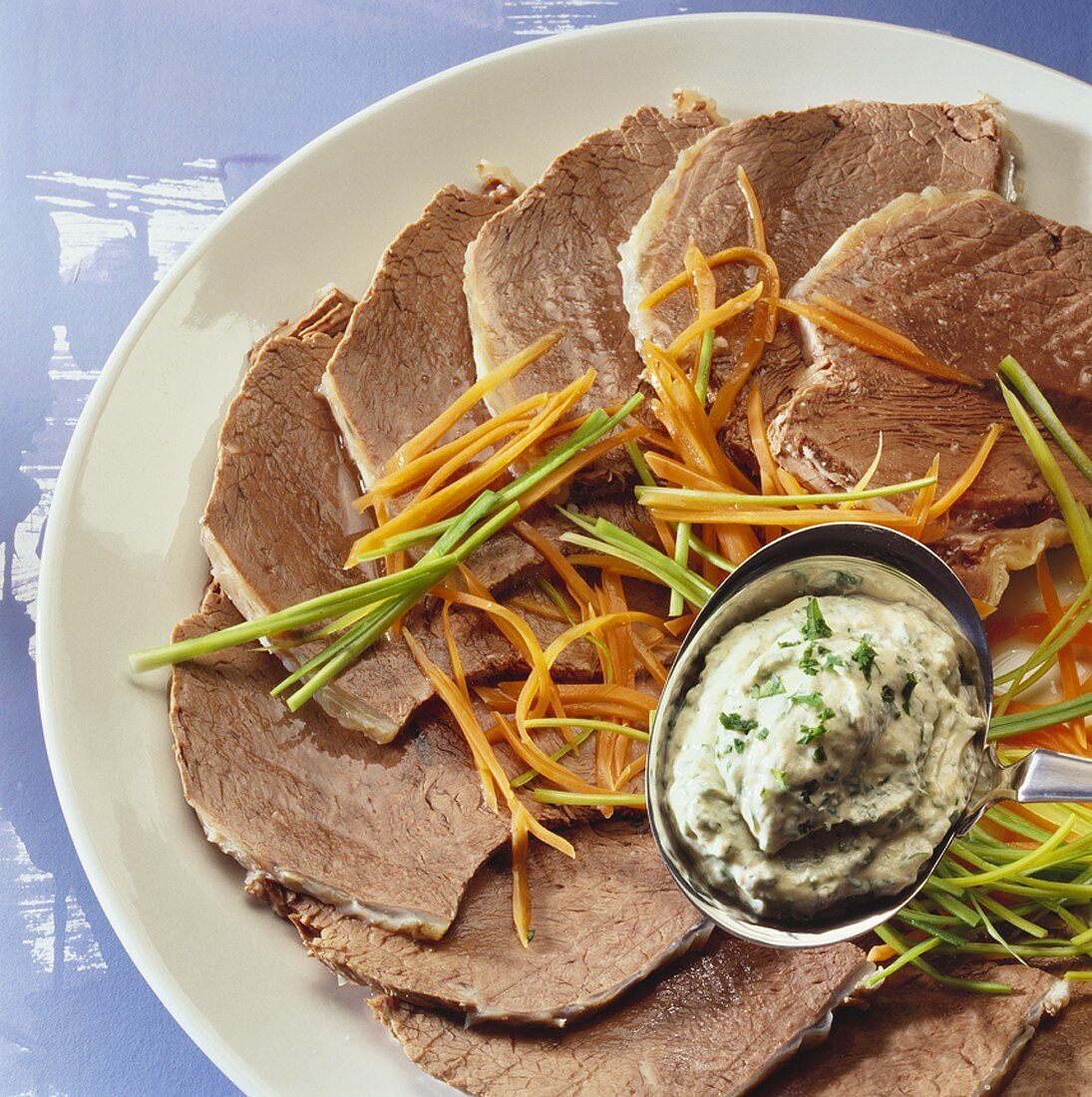 Ox breast with vegetables and herb sauce