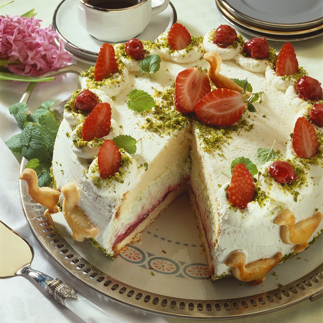 Strawberry cream cake, decorated with pastry geese