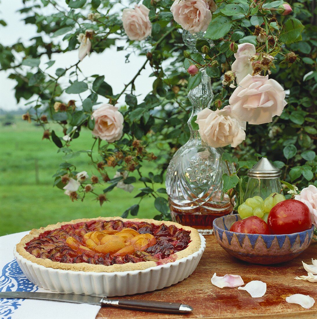 Round plum and peach tart