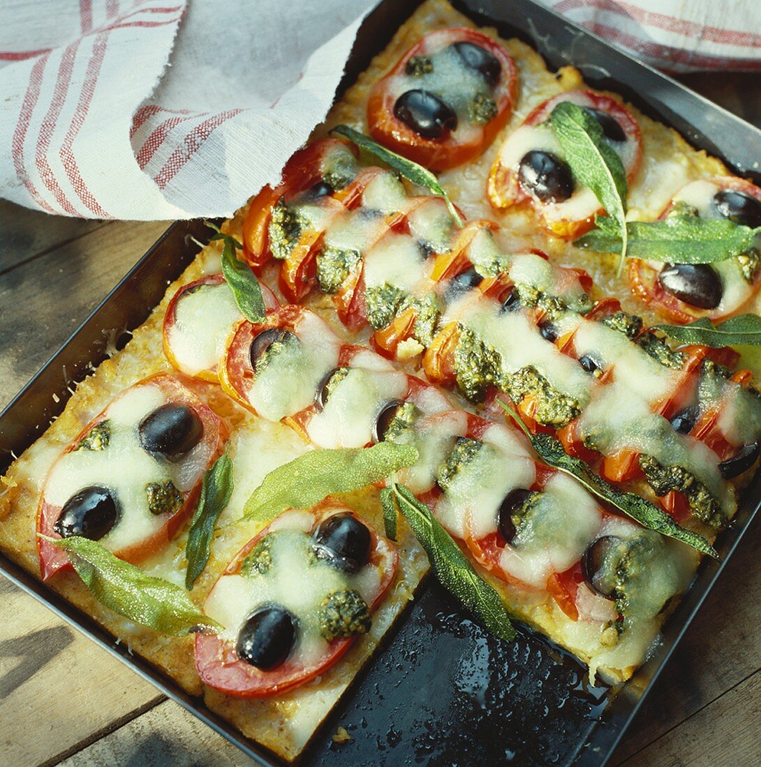 Baked polenta topped with vegetables and cheese