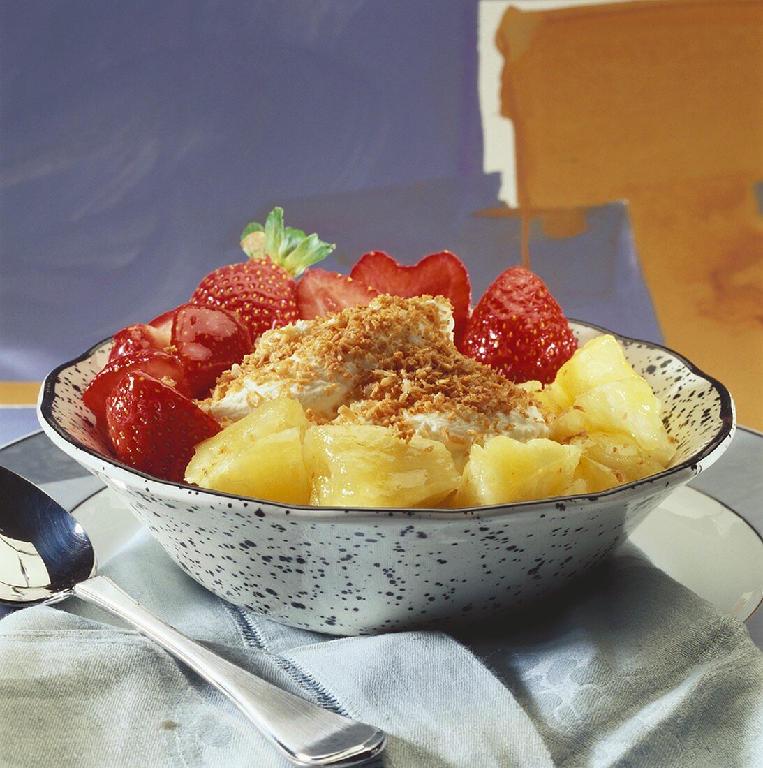 Pineapple and strawberries with rum cream