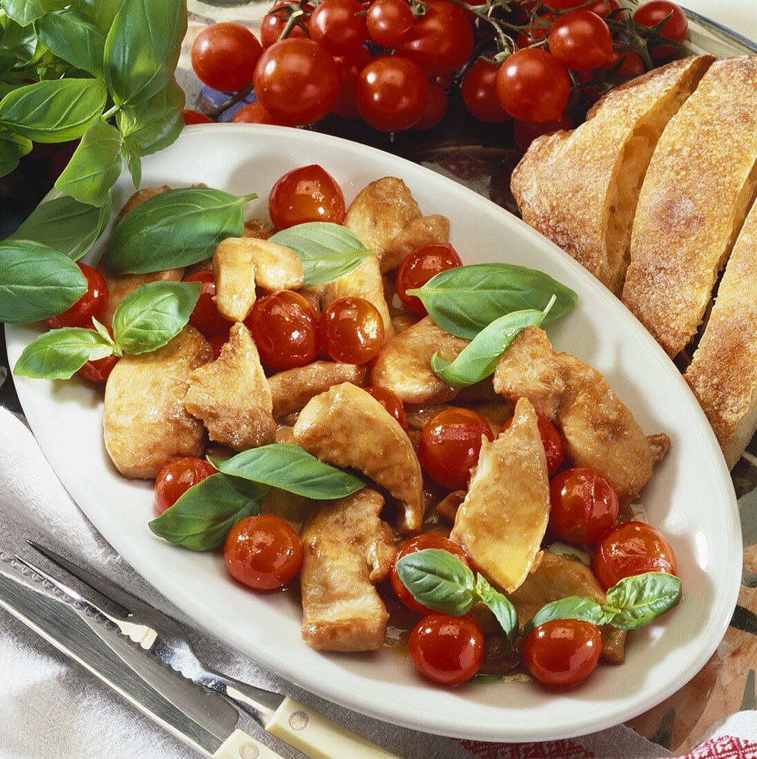 Pan-fried chicken with glazed cherry tomatoes