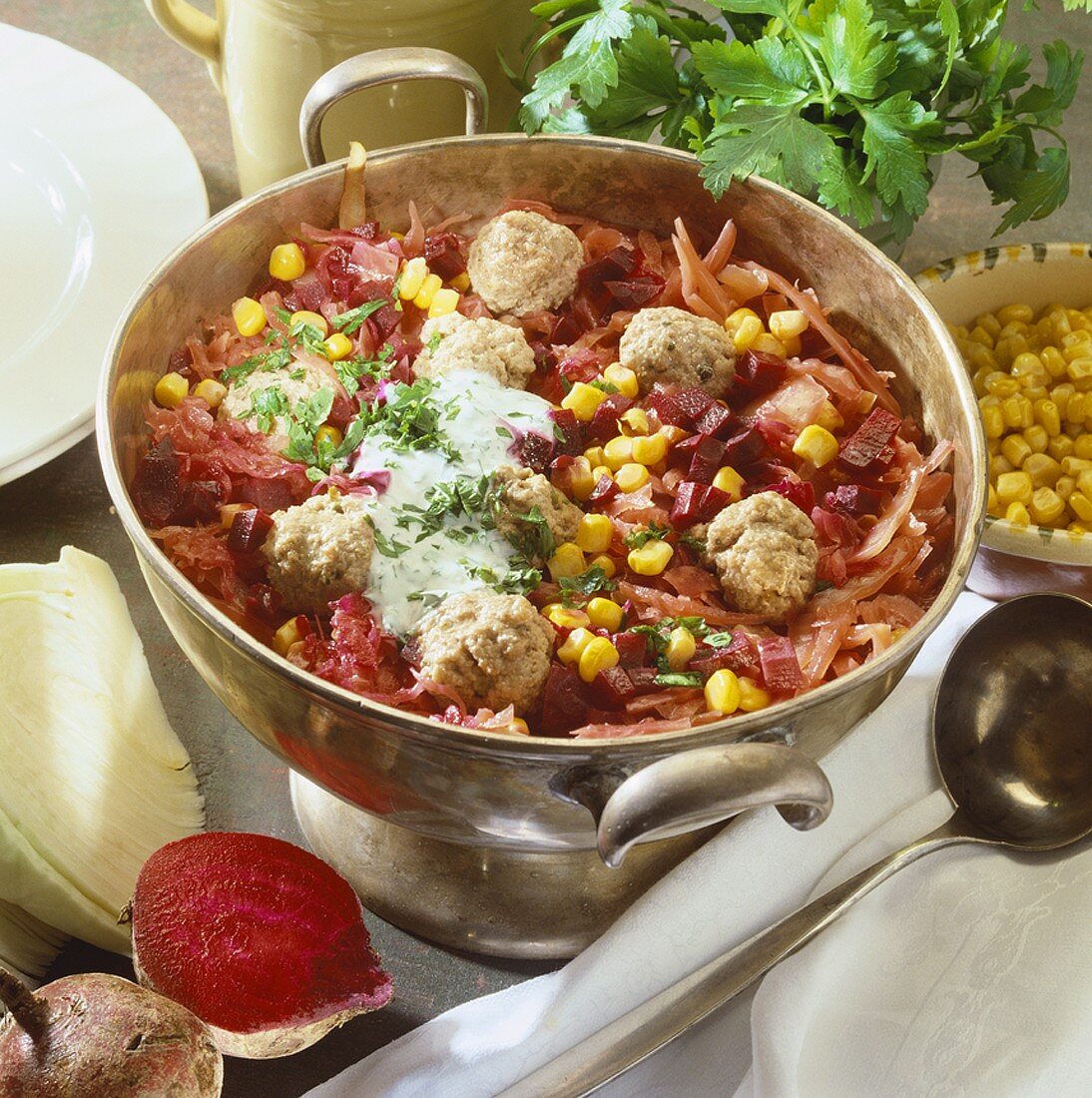 Beetroot stew with sweetcorn and meatballs