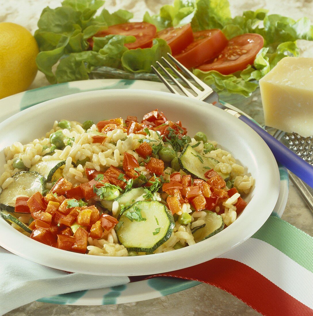 Risotto mit Tomaten, Erbsen und Zucchini