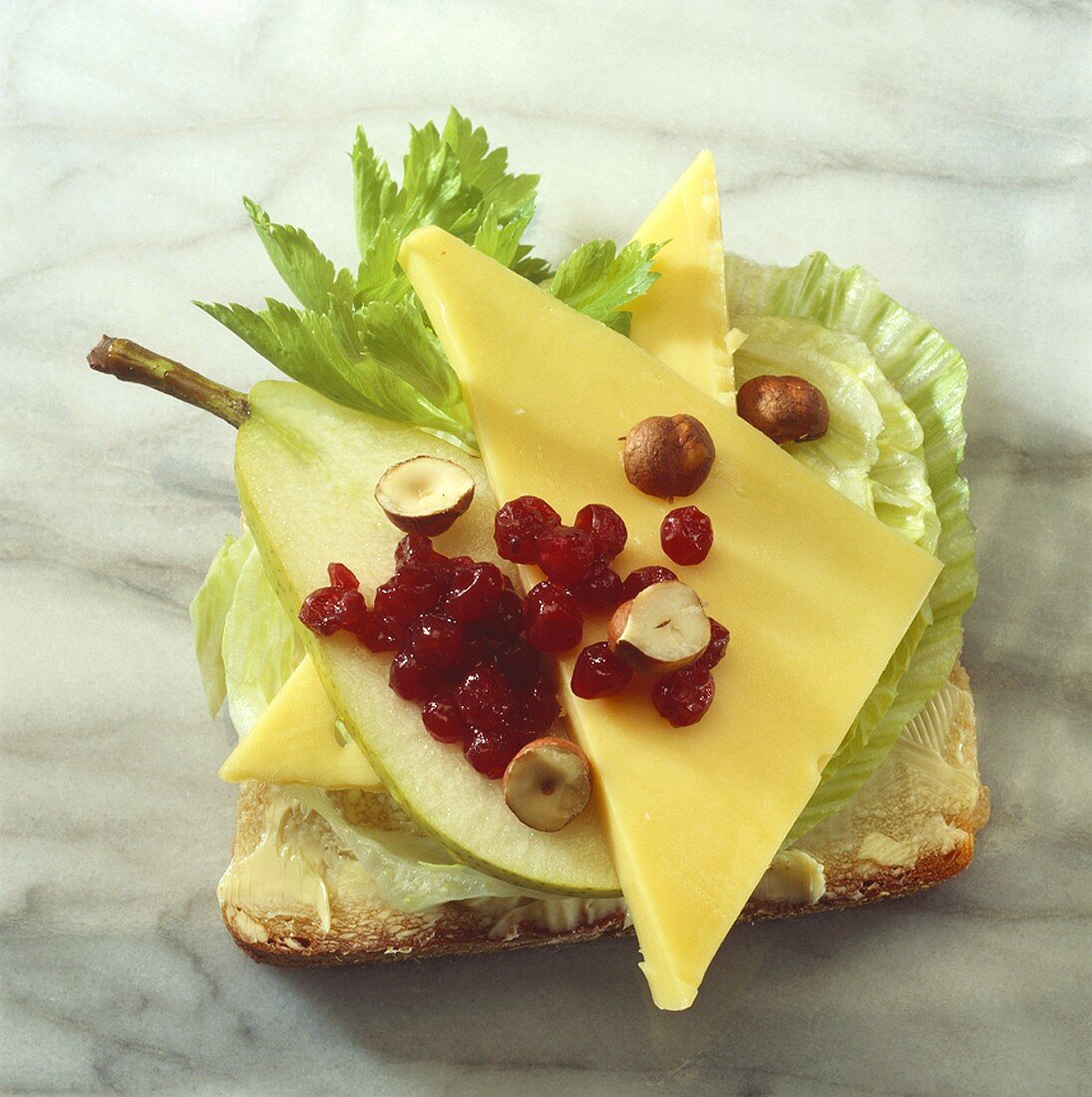 Gouda, pear and cranberries on bread