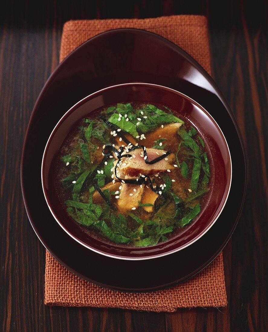 Miso soup with tuna and herbs