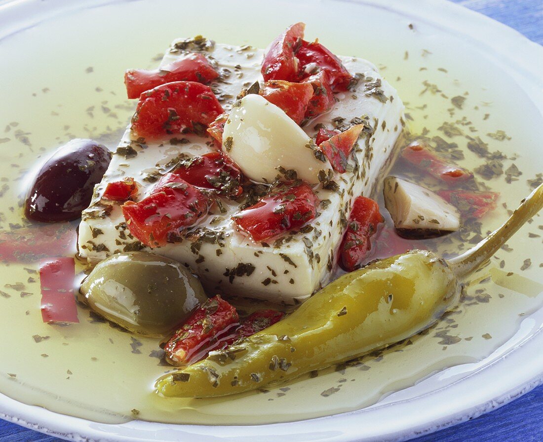 Marinated sheep's cheese with chilli and olives
