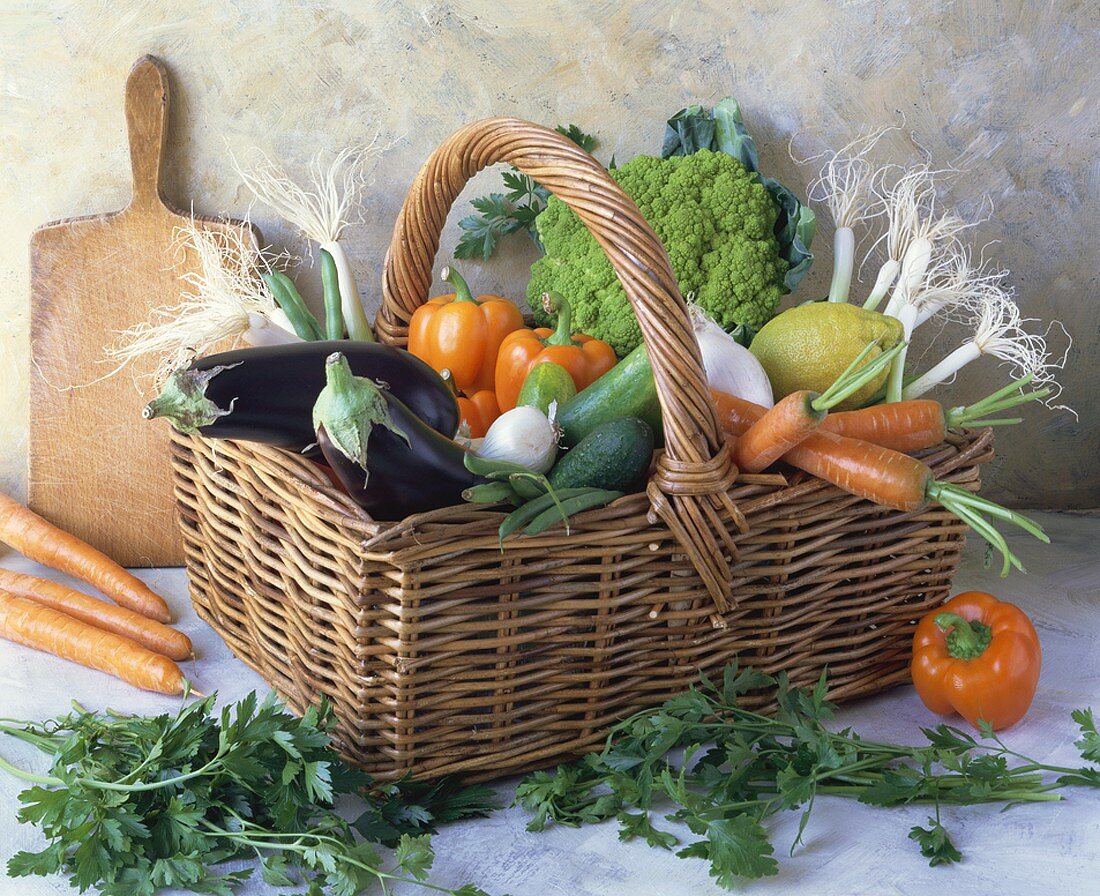 Basket of vegetables, parsley beside it